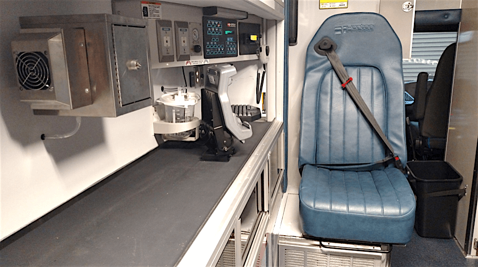 EICs custom Narcotic enclosure cooling unit inside a DC Fire Ambulance. Pictured in the top left is EIC Solutions’ custom narcotic enclosure cooling system inside of an ambulance for DC Fire.